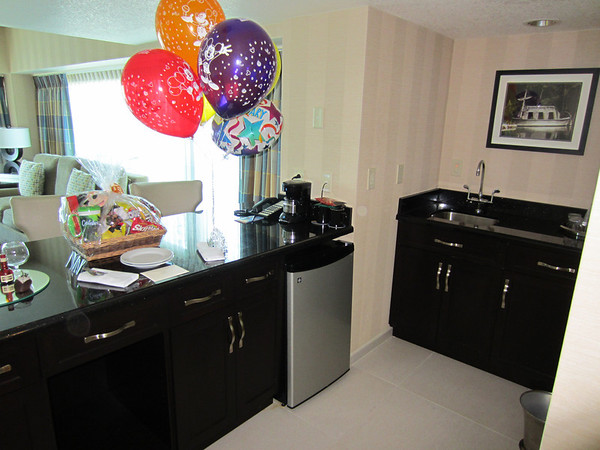 The kitchen features a refrigerator and sink. (The basket and balloons were bought separately for a special occasion.  They are not included, but were delivered through Disney's Gift Services and waiting in the room.)