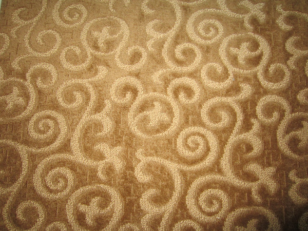 The carpeting in the room features a pattern chock full of hidden Mickeys.