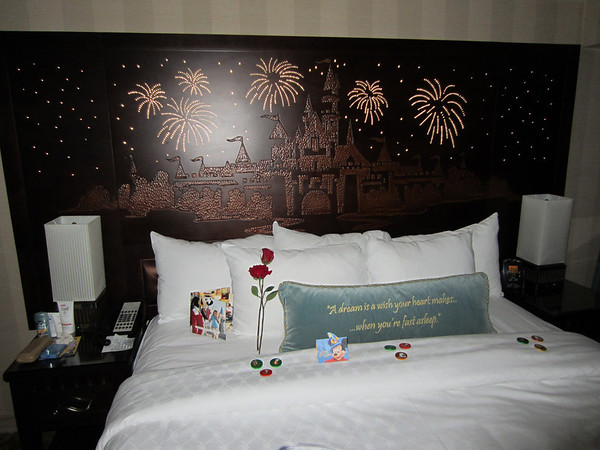 The headboard all lit up.  At night, the hotel has a turn down service.  They leave you chocolates on your pillow. (The roses were for a special celebration and aren't normally provided.)