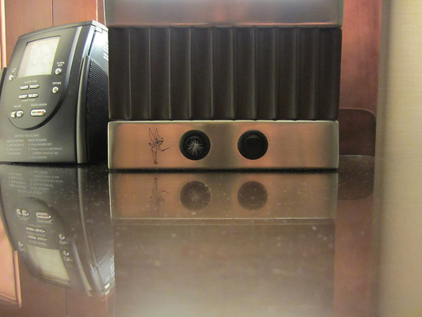 The LED lights on the headboard are controlled by a special switch located on one of the lamps.  When you switch on the lights, it plays the song 