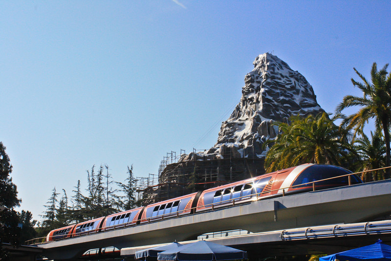 Monorail Orange pulling into Tomorrowland Station.