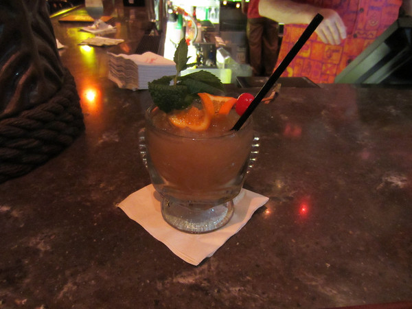 The Hippopotomai-Tai - light and dark rums, orange curacao, almond syrup, organic agave nectar and freshly squeezed lime juice. Served in a souvenir tiki glass.  This drink is EXTREMELY SWEET!