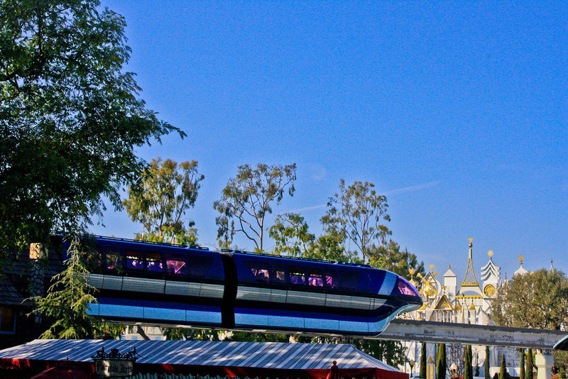 Monorail Blue with It's a Small World in the background.