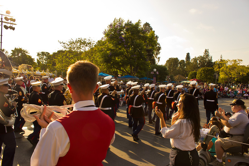 Even cast members pause a moment to cheer on the band. Even cast members pause a moment to cheer on the band.