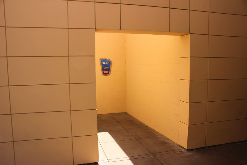 Entrance to Turtle Talk with Crush next to the restrooms in between Off the Page and Disney JR on Stage.