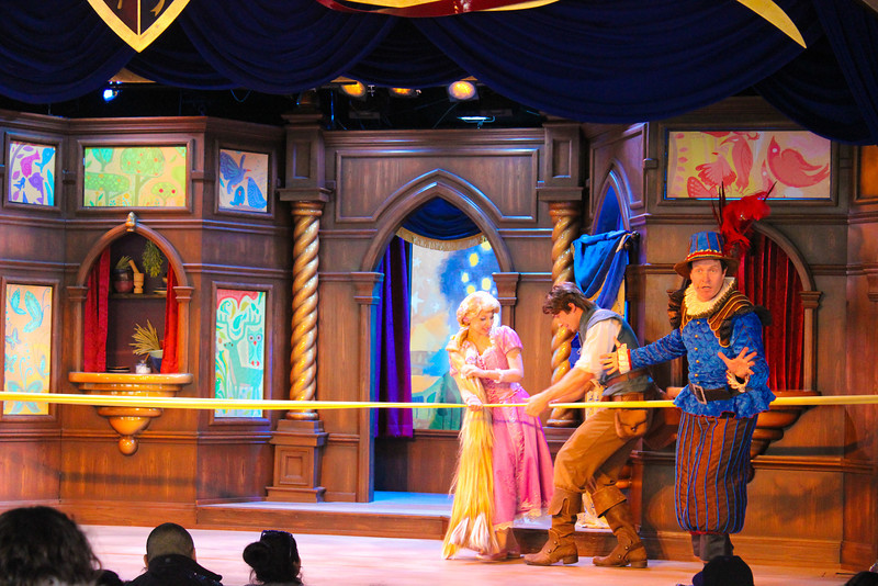 Climbing down the tower to escape.