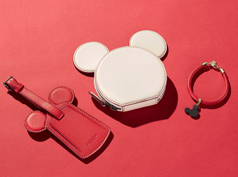 Disney Coach leather coin purse, bag tag and bracelet.